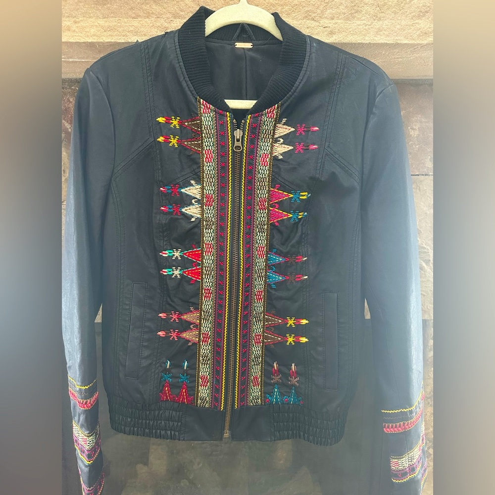 Free people, size small vintage leather moto jacket. Used, but great condition.